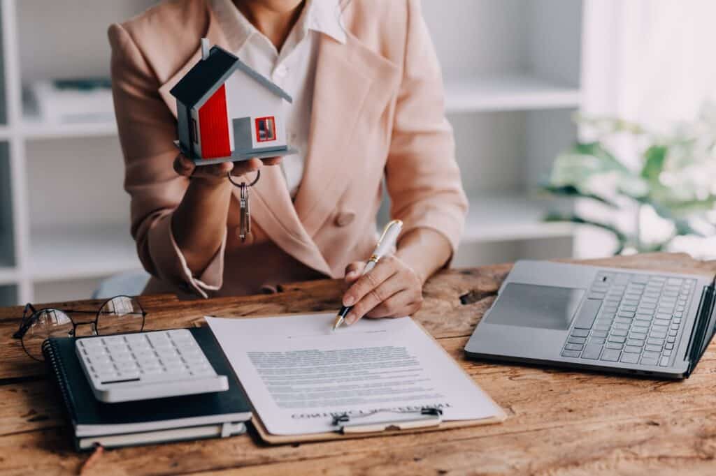 Tax protest professional analyzing property data and market research for client cases